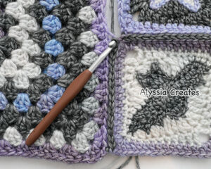 attaching granny square panel to the back